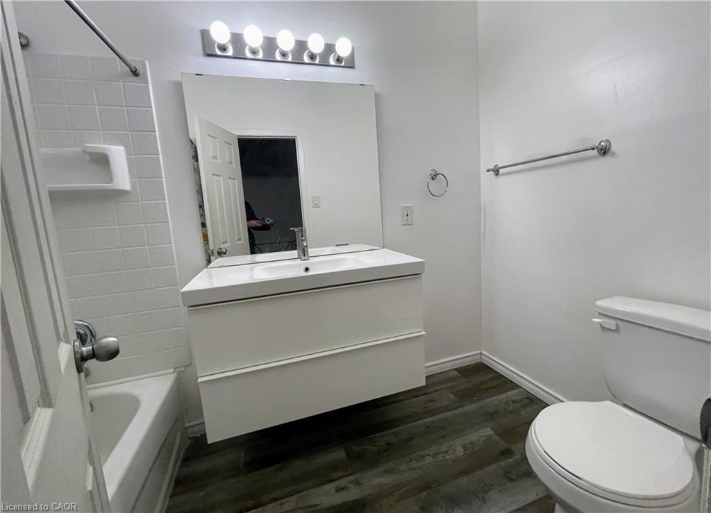 Completed modern bathroom tiling and vanity area