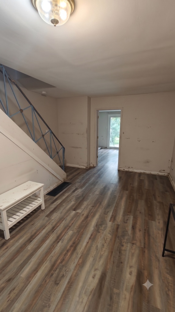 Staircase area and railings before preparation and painting